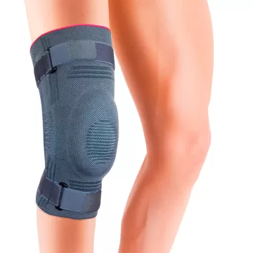 Бандаж на коліно Orthocare 6920 Genucare Comfort plus з ребрами жорсткості і ременями